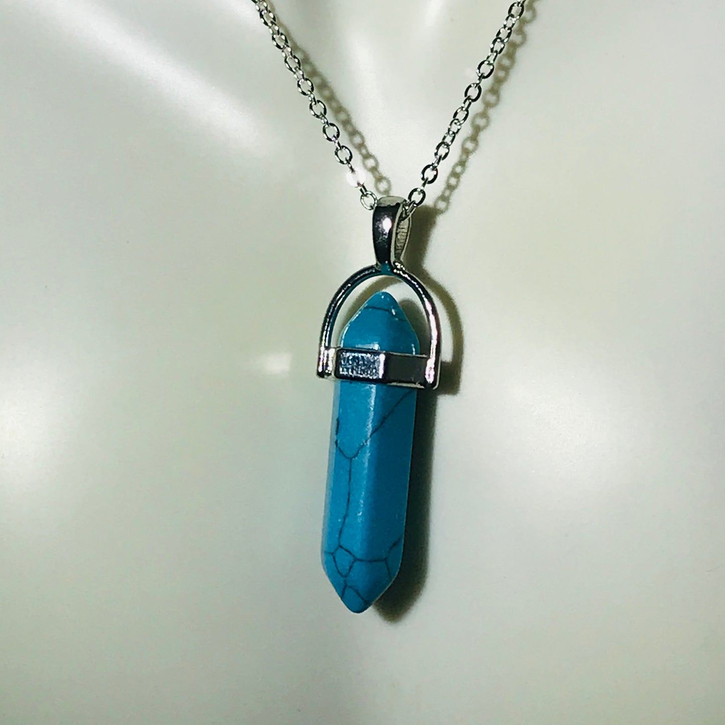 Blue Turquoise gemstone crystal point pendant necklace.